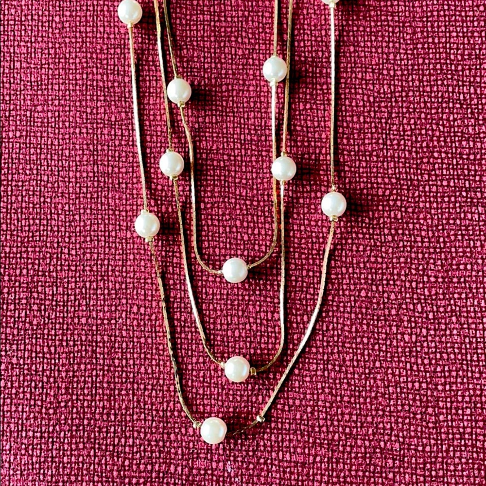Gold pearl-like necklace